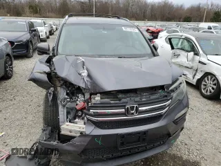 2017 Honda Pilot EX-L with VIN 5FNYF5H52HB017054, listed as a Copart auction lot 88710325 with 139,726 mi miles and Salvage Title. Bid and sale history available at carsss.com. Image 5.