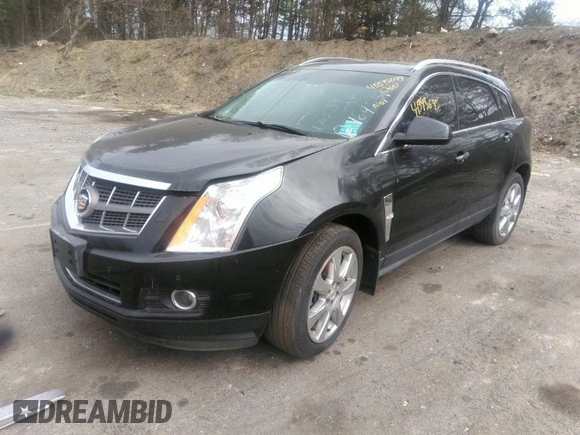 2012 Cadillac SRX Performance Collection z VIN 3GYFNBE39CS641892, wystawiony jako IAAI lot #41395695 z przebiegiem 95 303 mil mil oraz . Historia ofert i sprzedaży dostępna na DreamBid. Obrazek 1.