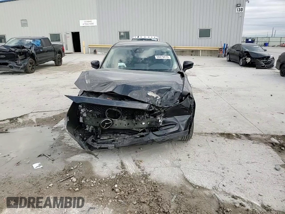 2021 Mazda CX-5 Sport with VIN JM3KFABM7M0325089, listed as a Copart auction lot 50479415 with 137,705 mi miles and Salvage Title. Bid and sale history available at carsss.com. Image 12.