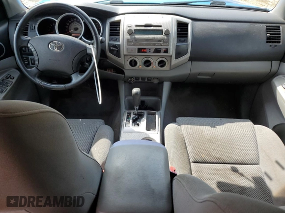 2009 Toyota Tacoma with VIN 3TMLU42N39M021727, listed as a Copart auction lot 65031095 with 200,386 mi miles and Salvage title. Bid and sale history available at DreamBid. Image 8.