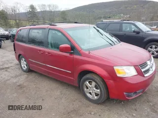2009 Dodge Grand Caravan SXT z VIN 2D8HN54X69R593635, wystawiony jako IAAI lot #39235325 z przebiegiem 207 996 mil mil oraz . Historia ofert i sprzedaży dostępna na DreamBid. Obrazek 1.