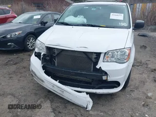 2015 Dodge Grand Caravan SE with VIN 2C4RDGBG2FR714404, listed as a IAAI auction lot 41860254 with 212,599 mi miles and . Bid and sale history available at DreamBid. Image 6.