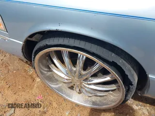 2003 Mercury Grand Marquis LS Premium z VIN 2MEFM75W63X623647, wystawiony jako IAAI lot #42236920 z przebiegiem 162 354 mil mil oraz . Historia ofert i sprzedaży dostępna na DreamBid. Obrazek 6.