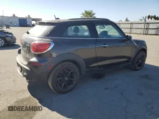 2015 MINI Paceman S z VIN WMWSS5C59FWN67379, wystawiony jako Copart lot #77353094 z przebiegiem 119 619 mil mil oraz Czysty tytuł • Clean title. Historia ofert i sprzedaży dostępna na DreamBid. Obrazek 3.