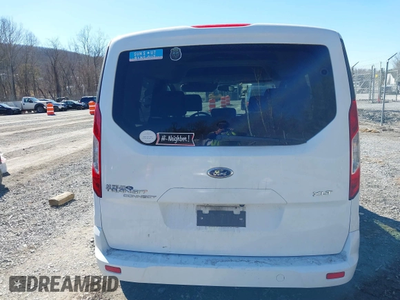 2014 Ford Transit Connect XLT z VIN NM0AE8F7XE1148356, wystawiony jako IAAI lot #41658732 z przebiegiem 128 180 mil mil oraz . Historia ofert i sprzedaży dostępna na DreamBid. Obrazek 16.
