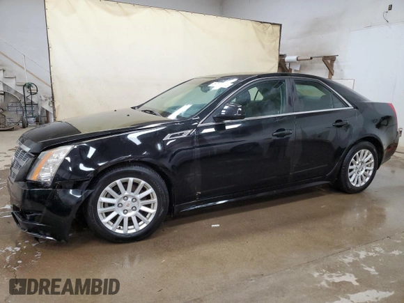 2011 Cadillac CTS Luxury with VIN 1G6DG5EY2B0168205, listed as a Copart auction lot 57127355 with 124,199 mi miles and Clean title. Bid and sale history available at DreamBid. Image 1.