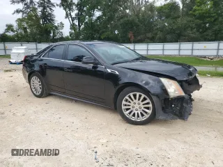 2013 Cadillac CTS Premium with VIN 1G6DP5E34D0112743, listed as a Copart auction lot 63029475 with 132,020 mi miles and Salvage title. Bid and sale history available at DreamBid. Image 4.
