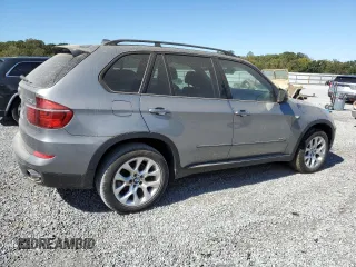 2011 BMW X5 35i z VIN 5UXZV4C50BL743135, wystawiony jako Copart lot #75401064 z przebiegiem 100 446 mil mil oraz Szkoda całkowita • Salvage title. Historia ofert i sprzedaży dostępna na DreamBid. Obrazek 3.