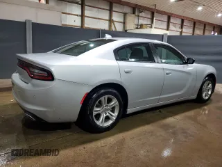 2023 Dodge Charger SXT z VIN 2C3CDXBG0PH630809, wystawiony jako Copart lot #57946105 z przebiegiem 50 749 mil mil oraz Tytuł czysty. Historia ofert i sprzedaży dostępna na DreamBid. Obrazek 3.