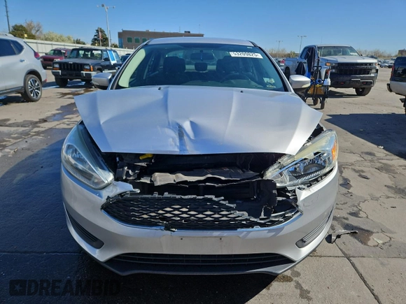 2017 Ford Focus SE with VIN 1FADP3F2XHL277097, listed as a Copart auction lot 53209825 with 100,384 mi miles and Salvage Title. Bid and sale history available at carsss.com. Image 5.
