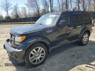 2011 Dodge Nitro Heat z VIN 1D4PU4GK7BW605931, wystawiony jako Copart lot #50860885 z przebiegiem 149 697 mil mil oraz Szkoda całkowita • Salvage title. Historia ofert i sprzedaży dostępna na DreamBid. Obrazek 1.