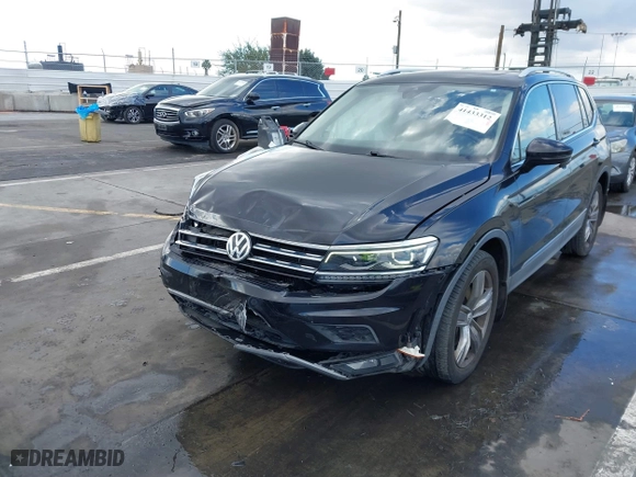 2018 Volkswagen Tiguan Wolfsburg Edition with VIN 3VV5B7AX7JM154967, listed as a IAAI auction lot 41433312 with 61,679 mi miles. Bid and sale history available at carsss.com. Image 6.