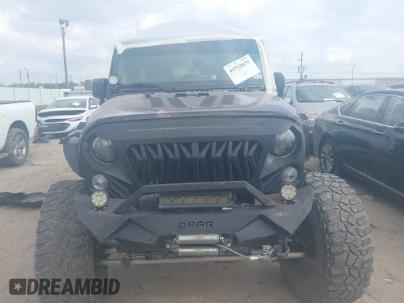 2014 Jeep Wrangler Unlimited Rubicon X with VIN 1C4HJWFG3EL274905, listed as a IAAI auction lot 41512631 with 123,961 mi miles and . Bid and sale history available at DreamBid. Image 13.