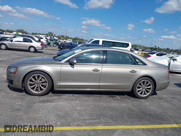2012 Audi A8 z VIN WAURVAFD0CN001646, wystawiony jako IAAI lot #41524110 z przebiegiem 105 187 mil mil oraz . Historia ofert i sprzedaży dostępna na DreamBid. Obrazek 14.