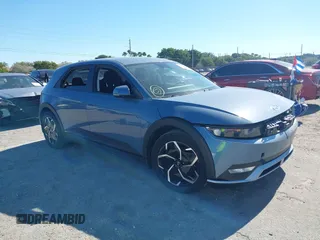 2023 Hyundai Ioniq 5 SE z VIN KM8KM4AE0PU187950, wystawiony jako IAAI lot #41293386 z przebiegiem 18 672 mil mil oraz . Historia ofert i sprzedaży dostępna na DreamBid. Obrazek 1.