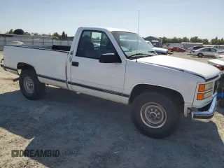 1999 GMC Sierra 1500 z VIN 1GTGC24RXXR721667, wystawiony jako Copart lot #58575985 z przebiegiem 201 752 mil mil oraz Czysty tytuł • Clean title. Historia ofert i sprzedaży dostępna na DreamBid. Obrazek 4.