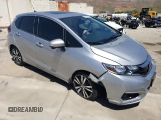 2018 Honda Fit EX with VIN 3HGGK5H88JM719092, listed as a Copart auction lot 61271925 with 86,516 mi miles and Salvage title. Bid and sale history available at DreamBid. Image 4.