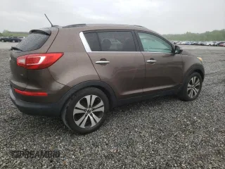 2011 Kia Sportage EX with VIN KNDPC3A2XB7080957, listed as a Copart auction lot 54665855 with 191,076 mi miles and Salvage title. Bid and sale history available at DreamBid. Image 3.