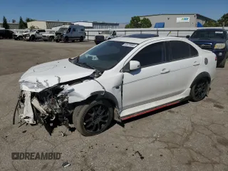 2014 Mitsubishi Lancer GT with VIN JA32U8FW3EU023651, listed as a Copart auction lot 65529995 with 106,323 mi miles and Salvage title. Bid and sale history available at DreamBid. Image 1.
