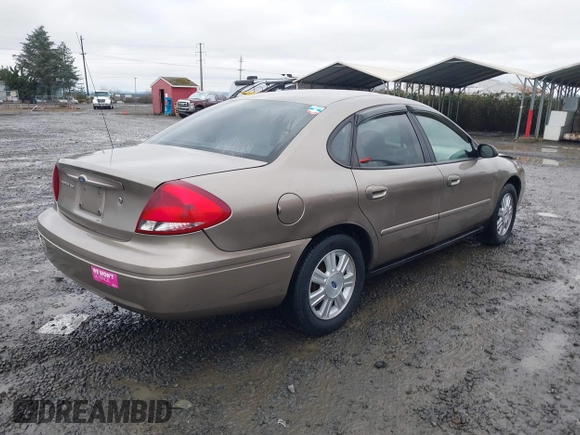 2006 Ford Taurus SE z VIN 1FAFP53U26A197294, wystawiony jako IAAI lot #41506334 z przebiegiem 180 411 mil mil oraz . Historia ofert i sprzedaży dostępna na DreamBid. Obrazek 4.