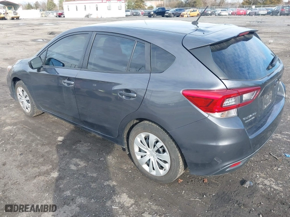 2020 Subaru Impreza with VIN 4S3GTAA66L1714762, listed as a IAAI auction lot 41154150 with 63,009 mi miles. Bid and sale history available at carsss.com. Image 3.