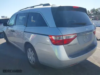 2013 Honda Odyssey LX with VIN 5FNRL5H2XDB065141, listed as a IAAI auction lot 41712328 with 174,020 mi miles. Bid and sale history available at carsss.com. Image 3.