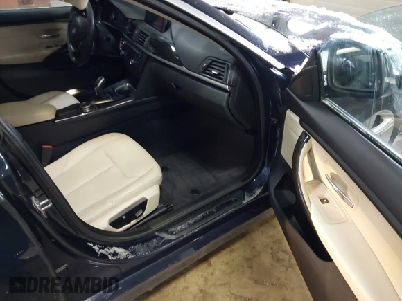 2015 BMW 4 Series 428i xDrive with VIN WBA4A7C57FD414955, listed as a IAAI auction lot 41609214 with 69,125 mi miles and . Bid and sale history available at DreamBid. Image 5.