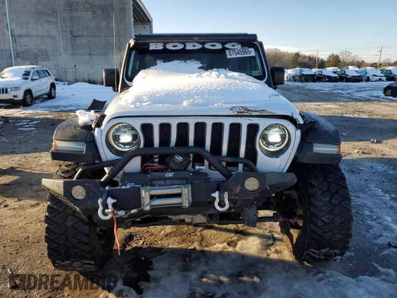 2018 Jeep Wrangler Unlimited Rubicon with VIN 1C4HJXFG8JW104425, listed as a Copart auction lot 87545965 with 62,988 mi miles and Salvage title. Bid and sale history available at DreamBid. Image 5.