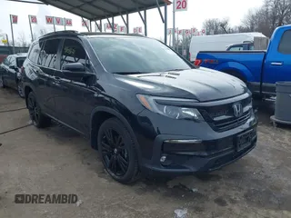 2022 Honda Pilot Special Edition with VIN 5FNYF6H2XNB059737, listed as a IAAI auction lot 41608678 with 50,273 mi miles and . Bid and sale history available at carsss.com. Image 1.