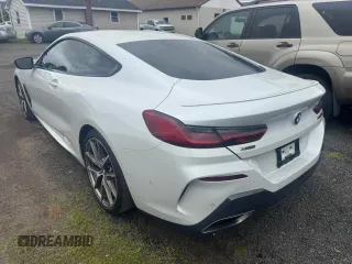 2019 BMW 8 Series M850i xDrive z VIN WBABC4C57KBJ35771, wystawiony jako Copart lot #59172615 z przebiegiem 68 270 mil mil oraz Tytuł czysty. Historia ofert i sprzedaży dostępna na DreamBid. Obrazek 2.