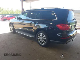 2014 Mercedes-Benz GL 450 z VIN 4JGDF7CE7EA395551, wystawiony jako IAAI lot #42247332 z przebiegiem 105 636 mil mil oraz . Historia ofert i sprzedaży dostępna na DreamBid. Obrazek 3.