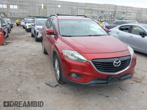 2015 Mazda CX-9 Grand Touring with VIN JM3TB2DA6F0460785, listed as a IAAI auction lot 42474705 with 62,202 mi miles and . Bid and sale history available at DreamBid. Image 1.