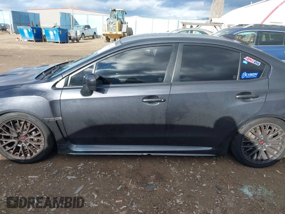 2015 Subaru WRX with VIN JF1VA1A65F9818409, listed as a IAAI auction lot 40895247 with 73,273 mi miles. Bid and sale history available at carsss.com. Image 14.