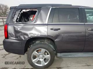 2015 Chevrolet Tahoe LT with VIN 1GNSCBKC5FR504459, listed as a IAAI auction lot 41689405 with 141,783 mi miles and . Bid and sale history available at DreamBid. Image 13.