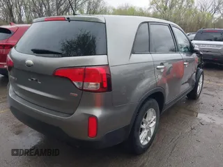 2014 Kia Sorento LX with VIN 5XYKT3A67EG477367, listed as a IAAI auction lot 41911249 with 172,320 mi miles and . Bid and sale history available at DreamBid. Image 4.