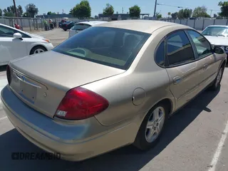 2000 Ford Taurus SEL with VIN 1FAFP56S3YA211717, listed as a IAAI auction lot 42249737 with 267,754 mi miles and . Bid and sale history available at DreamBid. Image 4.