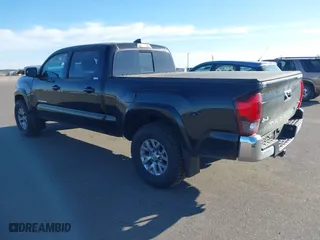 2019 Toyota Tacoma 4WD SR5 with VIN 3TMDZ5BN1KM060088, listed as a IAAI auction lot 41804525 with 69,893 mi miles. Bid and sale history available at carsss.com. Image 3.