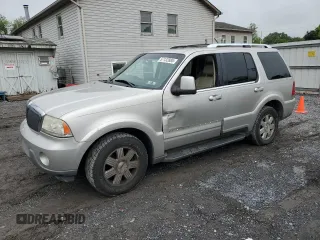 2003 Lincoln Aviator Premium z VIN 5LMEU78H73ZJ00165, wystawiony jako Copart lot #57132885 z przebiegiem 148 222 mil mil oraz Szkoda całkowita • Salvage title. Historia ofert i sprzedaży dostępna na DreamBid. Obrazek 1.