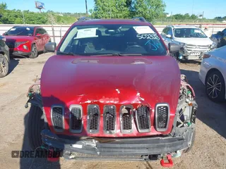 2017 Jeep Cherokee Trailhawk z VIN 1C4PJMBS9HW502323, wystawiony jako IAAI lot #42293817 z przebiegiem 153 127 mil mil oraz . Historia ofert i sprzedaży dostępna na DreamBid. Obrazek 12.