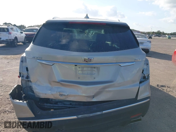2017 Cadillac XT5 FWD with VIN 1GYKNARS0HZ174625, listed as a IAAI auction lot 41520634 with 116,169 mi miles. Bid and sale history available at carsss.com. Image 6.