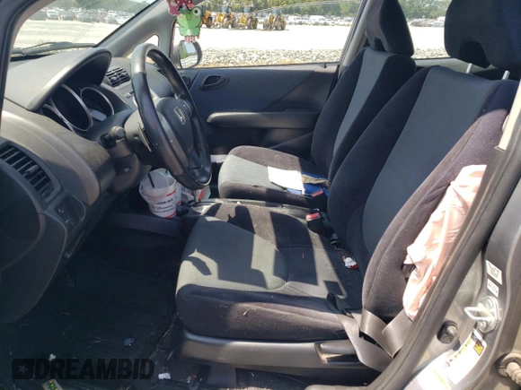 2007 Honda Fit Sport with VIN JHMGD38657S058051, listed as a Copart auction lot 69014644 with 189,714 mi miles and Salvage Title. Bid and sale history available at carsss.com. Image 7.
