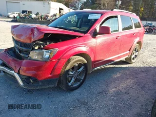 2017 Dodge Journey Crossroad Plus z VIN 3C4PDCGG1HT548160, wystawiony jako IAAI lot #40948489 z przebiegiem 129 427 mil mil oraz . Historia ofert i sprzedaży dostępna na DreamBid. Obrazek 2.