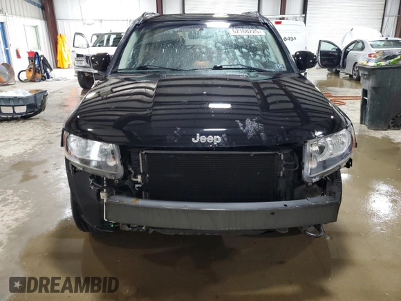 2016 Jeep Compass Latitude with VIN 1C4NJDEB2GD573909, listed as a Copart auction lot 62168225 with 70,944 mi miles and Salvage title. Bid and sale history available at DreamBid. Image 5.