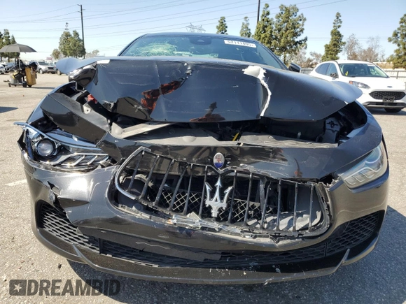 2017 Maserati Ghibli S с VIN ZAM57RSA1H1212595, выставлен на аукционе Copart как лот 52111405 с пробегом 55 158 миль миль и Списание • Salvage title. История ставок и продаж доступна на DreamBid. Изображение 5.