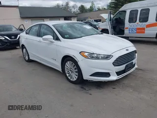2013 Ford Fusion SE Hybrid with VIN 3FA6P0LUXDR328784, listed as a IAAI auction lot 42231399 with 169,462 mi miles and . Bid and sale history available at carsss.com. Image 1.