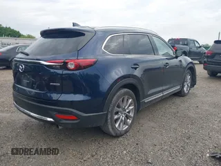 2021 Mazda CX-9 Carbon Edition z VIN JM3TCBDY7M0536005, wystawiony jako IAAI lot #42424129 z przebiegiem 48 005 mil mil oraz . Historia ofert i sprzedaży dostępna na DreamBid. Obrazek 4.