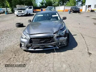 2014 Infiniti Q50 Premium z VIN JN1BV7AR1EM693471, wystawiony jako Copart lot #58991305 z przebiegiem 144 323 mil mil oraz Szkoda całkowita • Salvage title. Historia ofert i sprzedaży dostępna na DreamBid. Obrazek 13.