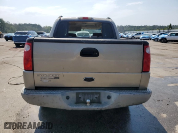 2005 Ford Explorer Sport Trac XLS с VIN 1FMZU67K25UA63831, выставлен на аукционе Copart как лот 57595845 с пробегом 222 491 миль миль и Списание • Salvage title. История ставок и продаж доступна на DreamBid. Изображение 6.