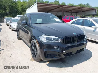 2018 BMW X6 xDrive50i with VIN 5UXKU6C58J0W39038, listed as a IAAI auction lot 40025654 with 106,080 mi miles. Bid and sale history available at carsss.com. Image 1.