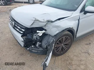 2018 Volkswagen Tiguan SEL z VIN 3VV3B7AXXJM039125, wystawiony jako IAAI lot #42125540 z przebiegiem 91 551 mil mil oraz . Historia ofert i sprzedaży dostępna na DreamBid. Obrazek 6.